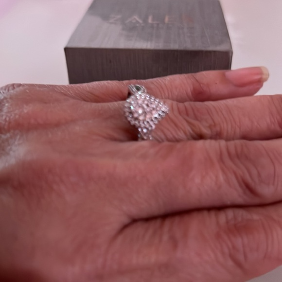 Engagement ring size 8 I bought it at Zales it is polished and clean - Picture 3 of 6